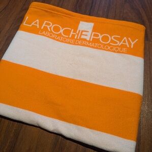 Brand New La Roche Posay Orange and White Towel